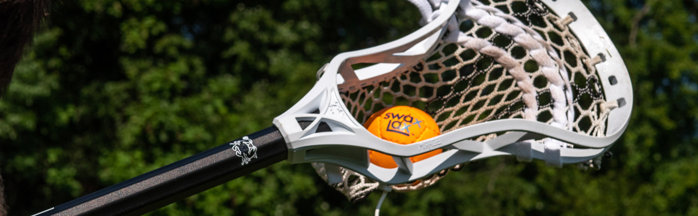 Swax Lax Lacrosse Practice Ball in Lacrosse Stick